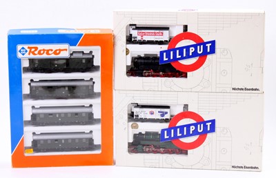 Lot 432 - A collection of Liliput and Roco boxed train...