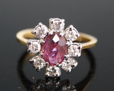 Lot 2207 - An 18ct yellow and white gold, ruby and...