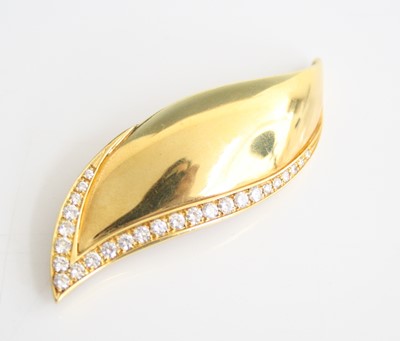 Lot 2229 - A yellow metal diamond set leaf brooch,...