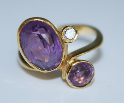 Lot 2528 - An 18ct yellow gold, amethyst and diamond...