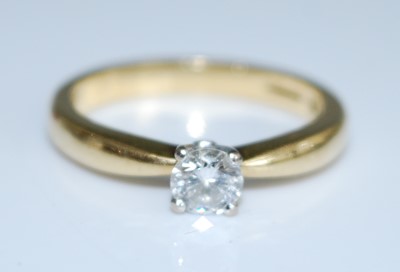 Lot 2529 - An 18ct yellow and white gold diamond single...