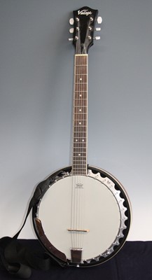 Lot 1217 - A Vintage six string banjo, having an 11 1/2"...