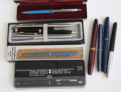 Lot 225 - A collection of fountain pens and ballpoints;...