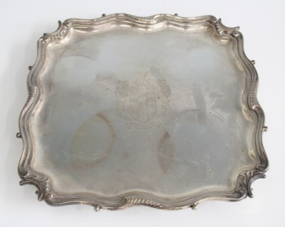 Lot 2175 - An Edwardian silver salver, of shaped square...
