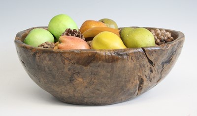 Lot 2331 - An 18th century elm bowl, being simply carved...