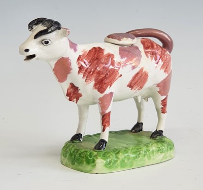 Lot 2085 - A circa 1830 Swansea pearlware cow creamer,...
