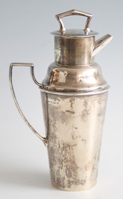 Lot 197 - An Art Deco silver cocktail jug by Asprey & Co,...