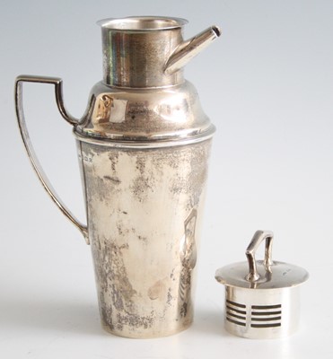 Lot 197 - An Art Deco silver cocktail jug by Asprey & Co,...