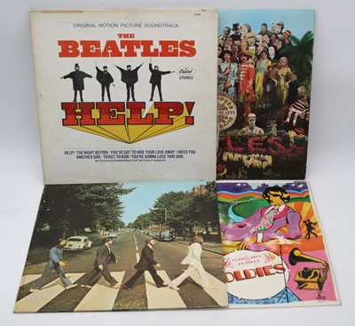 Lot 1110 - The Beatles and The Rolling Stones, a...