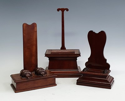 Lot 2312 - A 19th century mahogany charger stand, the...