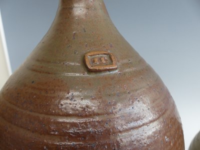 Lot 106 - A studio pottery ale barrel, partially brown...