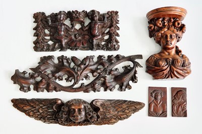 Lot 2320 - A collection of carved furniture mounts, to...