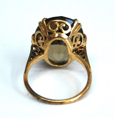 Lot 2533 - A 9ct yellow gold smoky quartz dress ring, the...