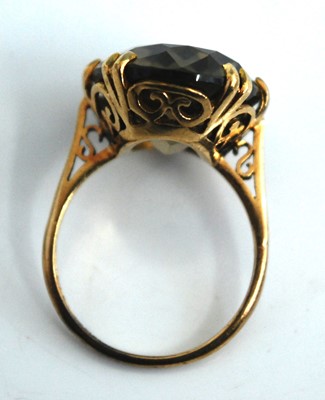 Lot 2533 - A 9ct yellow gold smoky quartz dress ring, the...