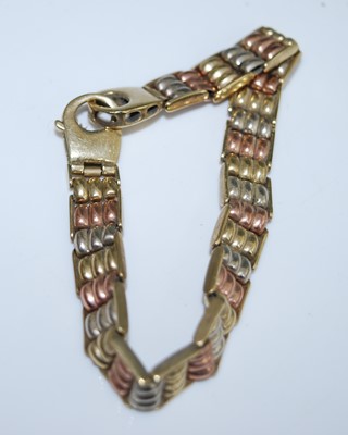 Lot 2536 - A 9ct yellow, rose and white gold bead link...