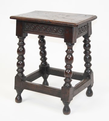 Lot 2630 - A circa 1700 oak joint stool, the one-piece...