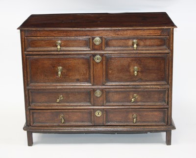 Lot 2639 - A circa 1700 joined oak chest, having a...