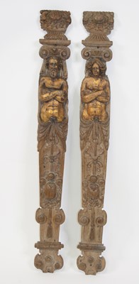 Lot 2593 - A pair of carved oak and parcel-gilt figural...