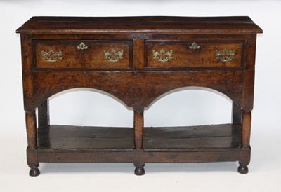 Lot 2599 - A George III joined oak dresser base, of small...