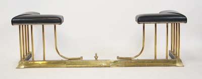 Lot 2690 - An Edwardian lacquered brass club fender,...