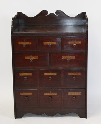 Lot 2691 - A mahogany and fruitwood apothecary...