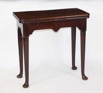 Lot 2693 - An early George III mahogany tea table, the...