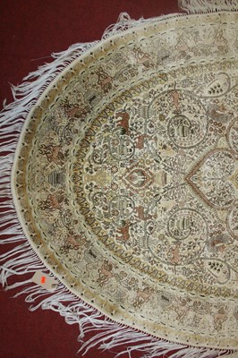 Lot 2671 - A Persian fineweave oval silk rug, having a...