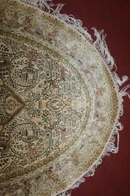 Lot 2671 - A Persian fineweave oval silk rug, having a...