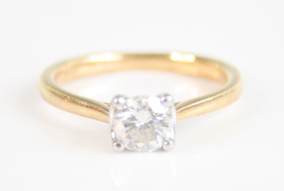 Lot 2214 - An 18ct gold diamond single stone ring, the...