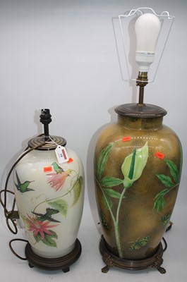 Lot 10 - Two modern table lamps, each decorated with...