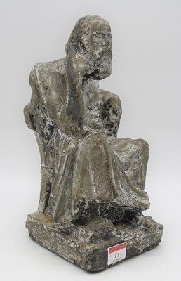 Lot 11 - A plaster figure of a seated man upon a square...