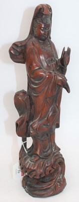 Lot 16 - An Eastern carved wood figure of Guanyin, h.39cm
