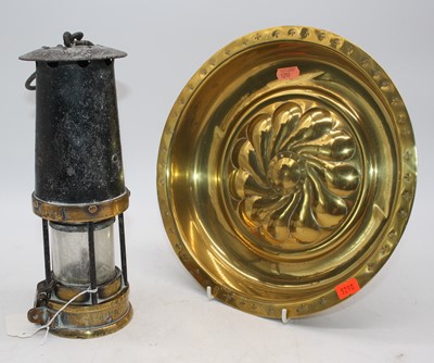 Lot 19 - A 19th century Nuremberg brass alms dish,...