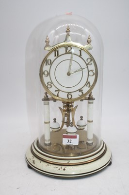 Lot 32 - A 20th century anniversary clock, housed under...