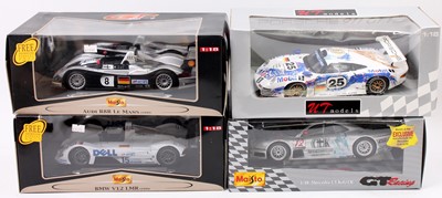 Lot 869 - Collection of 4 various boxed 1/18th scale Le...