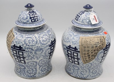 Lot 59 - A pair of Chinese blue & white porcelain...
