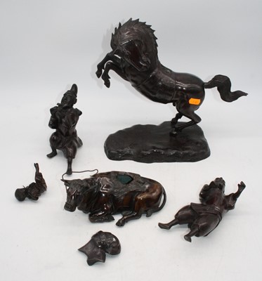 Lot 131 - A Japanese bronzed metal figure of an ox, 19cm;...