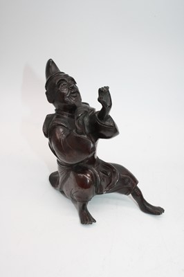 Lot 131 - A Japanese bronzed metal figure of an ox, 19cm;...
