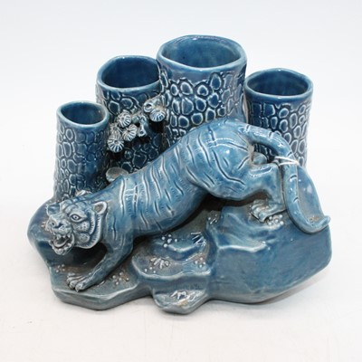 Lot 137 - A Chinese blue glazed model of a tiger, h.12cm