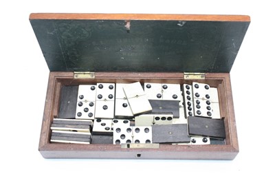 Lot 147 - A 19th century mahogany cased games compendium,...