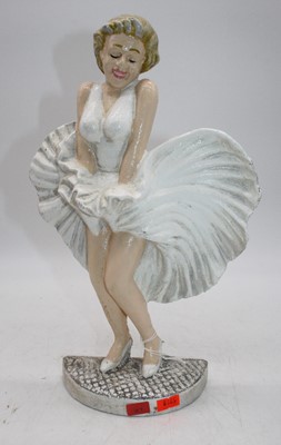 Lot 156 - A cast iron doorstop in the form of Marilyn...