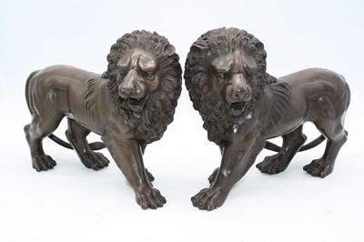 Lot 159 - Two bronzed models of lions, h.24cm
