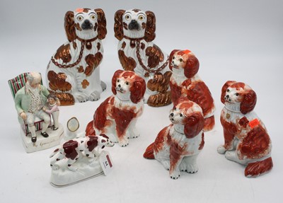 Lot 64 - A pair of Staffordshire models of spaniels,...