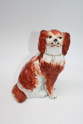 Lot 64 - A pair of Staffordshire models of spaniels,...