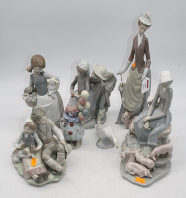 Lot 165 - A collection of seven Lladro porcelain figures,...