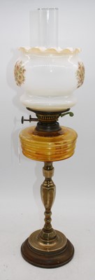 Lot 169 - A 19th century brass oil lamp, having milk...