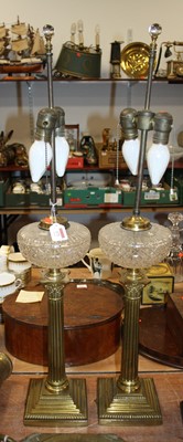 Lot 173 - A pair of reproduction brass table lamps, each...