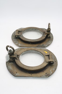 Lot 175 - Two brass ships port holes, 31 x 25cm