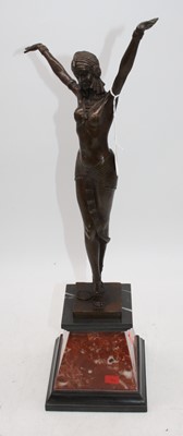 Lot 176 - An Art Deco style bronzed figure of a lady...