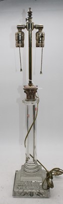 Lot 179 - A reproduction resin table lamp in the form of...